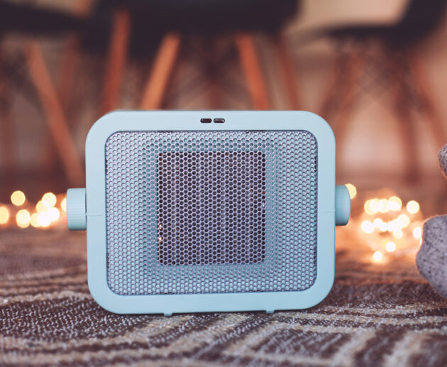 a blue heater on the carpet in a cosy room feet i 2026 01 11 09 30 07 utc scaled