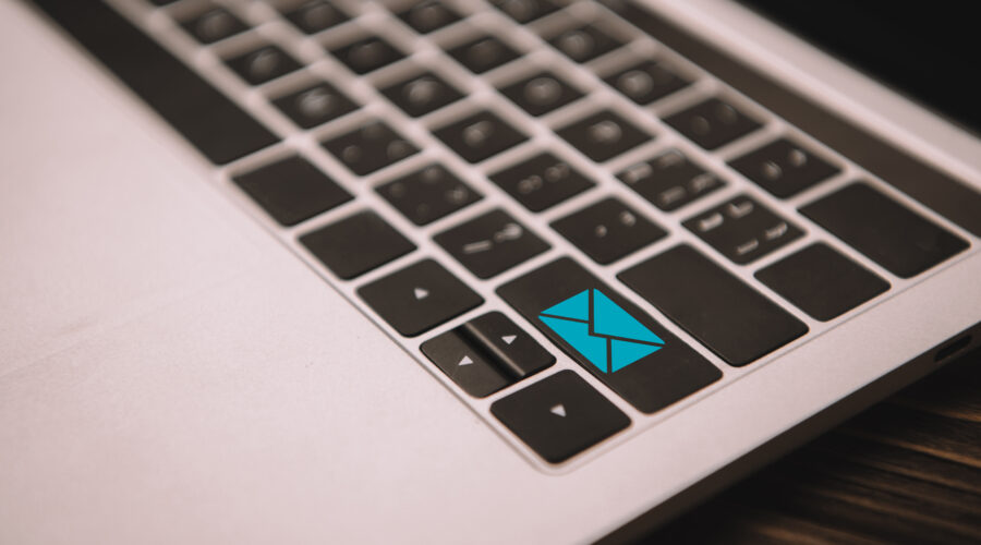 close up of laptop keyboard with email icon on but 2026 01 06 00 35 29 utc scaled