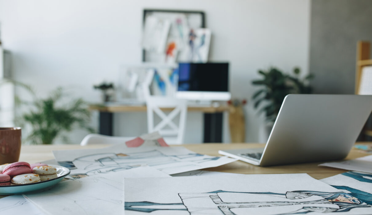 close up view of open laptop and sketches on table 2026 03 12 23 58 28 utc scaled