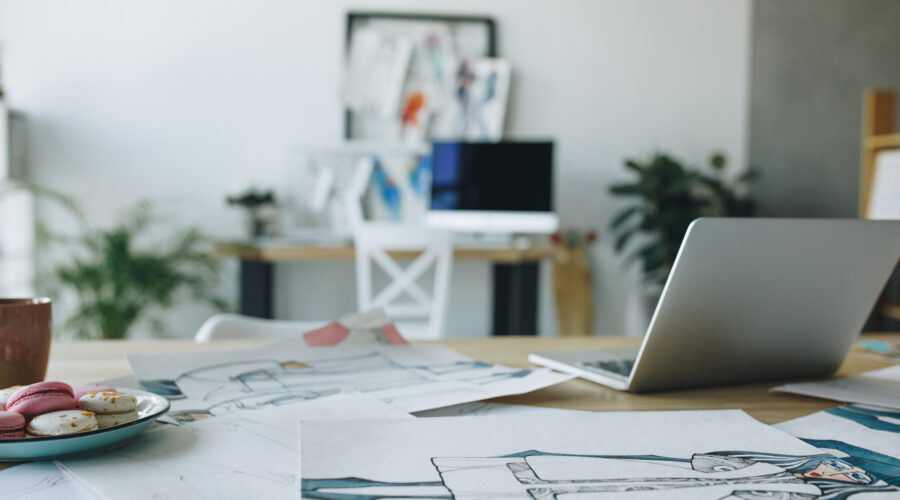 close up view of open laptop and sketches on table 2026 03 12 23 58 28 utc scaled
