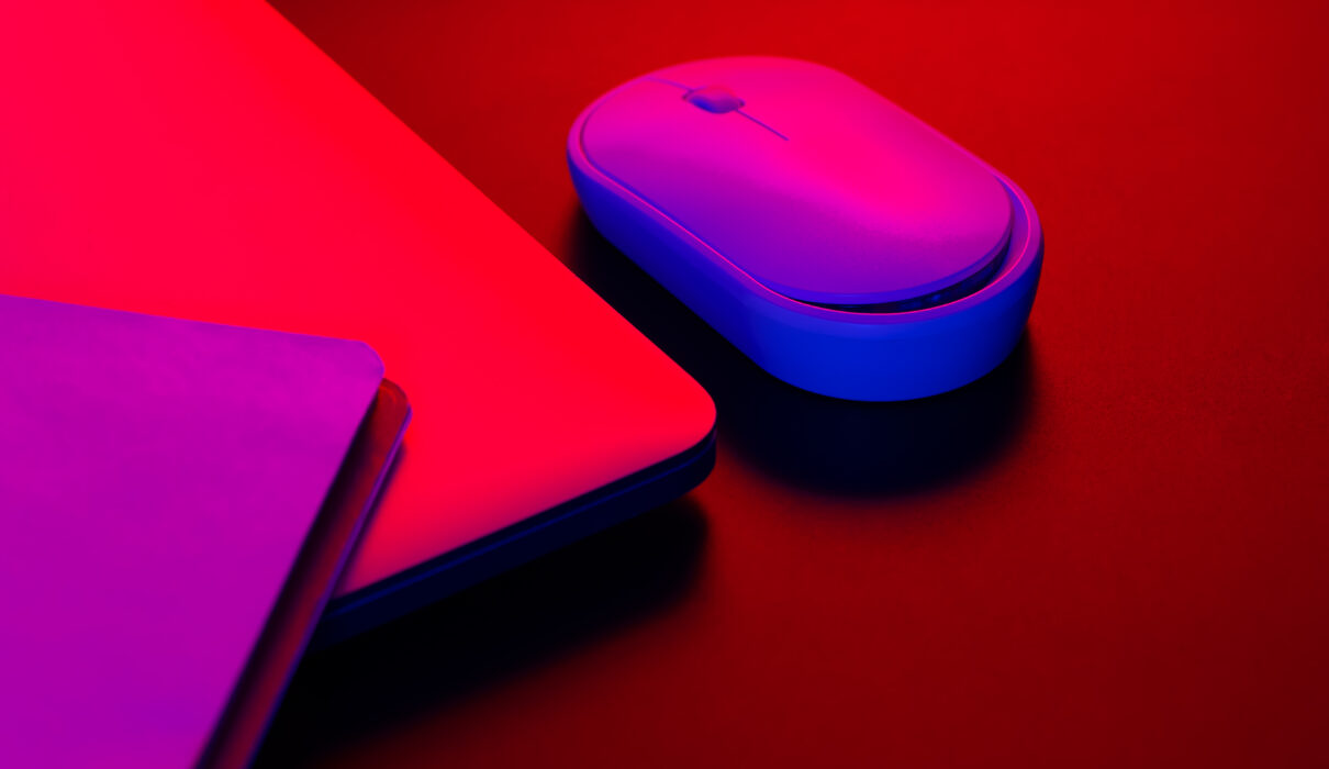 computer mouse near a laptop in neon lighting clo 2026 01 09 08 22 30 utc scaled