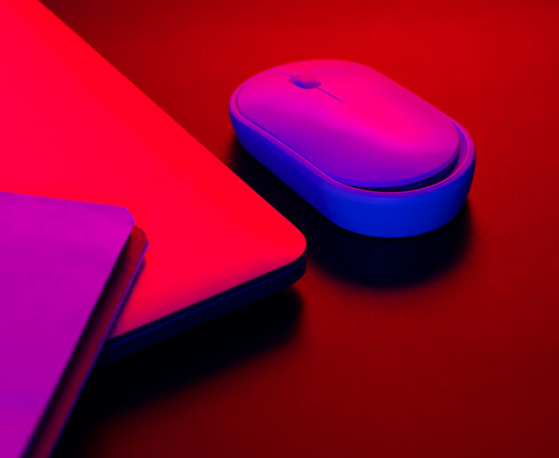 computer mouse near a laptop in neon lighting clo 2026 01 09 08 22 30 utc scaled