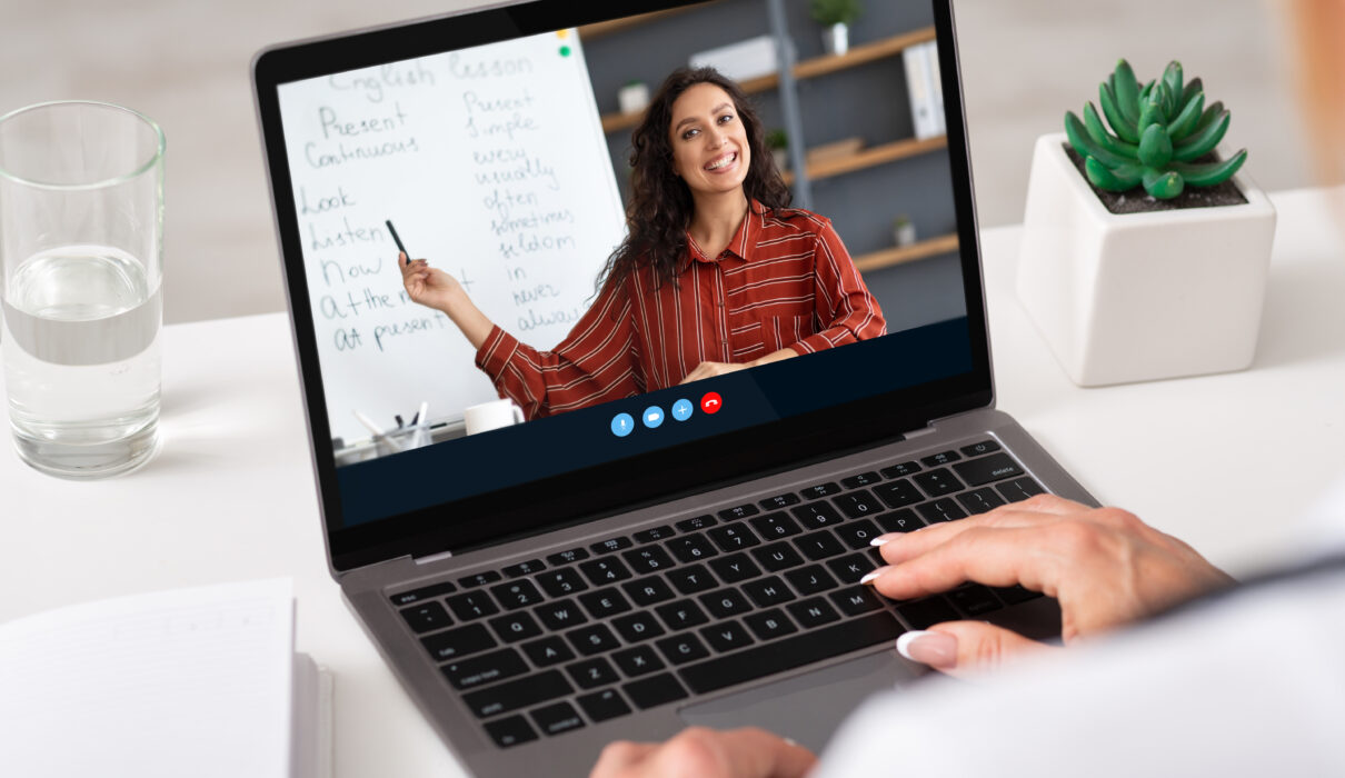 cropped adult woman watching online lesson with mi 2026 01 08 23 07 23 utc scaled