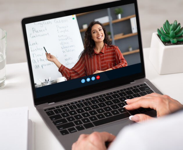 cropped adult woman watching online lesson with mi 2026 01 08 23 07 23 utc scaled