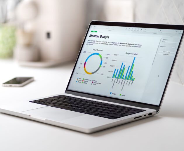 gray laptop with a monthly budged report with grap 2026 01 07 07 17 18 utc 1 scaled