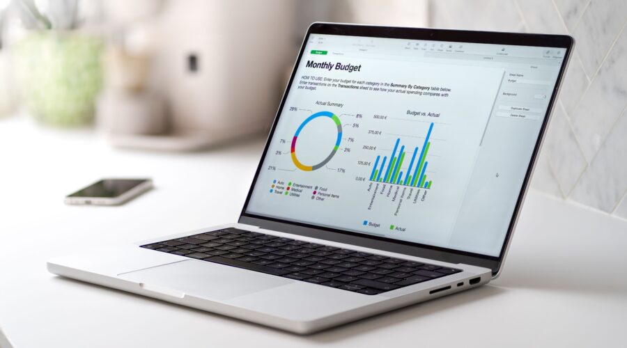 gray laptop with a monthly budged report with grap 2026 01 07 07 17 18 utc 1 scaled