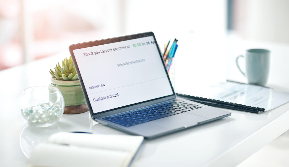 online payment confirmation laptop and empty offi 2026 01 09 11 04 30 utc scaled